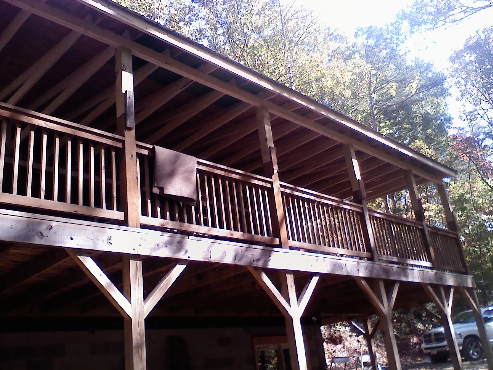 Timber framing under a new elevated porch and deck — Roof Leak Repair in Chataignier by Roofing Brothers